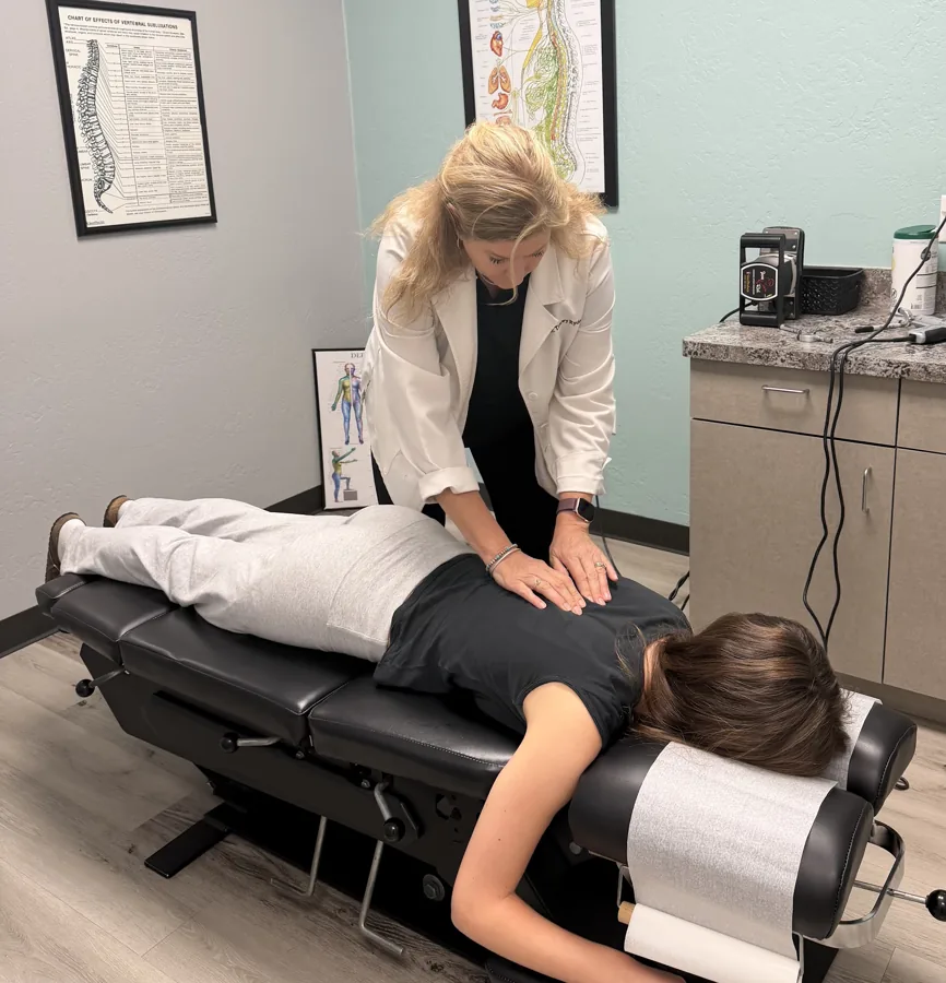 A chiropractic adjustment on the table at Ryder Chiropractic in Scottsdale