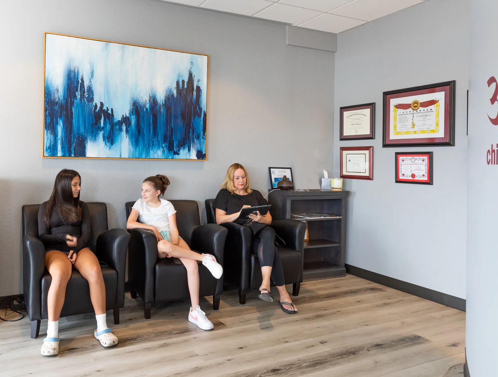 Patients in the waiting room at Ryder Chiropractic in Scottsdale